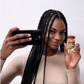 A range of models with different hair types nourished using Dyson Omega products.