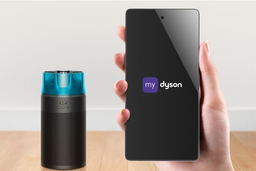 The Dyson HushJet Compact Purifier next to a phone screen showing the MyDyson app.
