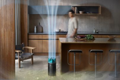 The Dyson HushJet Compact Purifier projects purified air in a large living room.