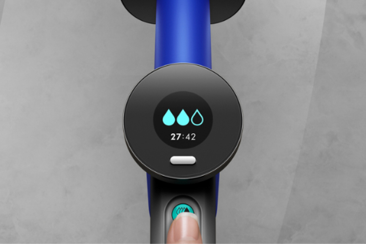 A close-up of the Dyson WashG1's LCD screen hydration icons.